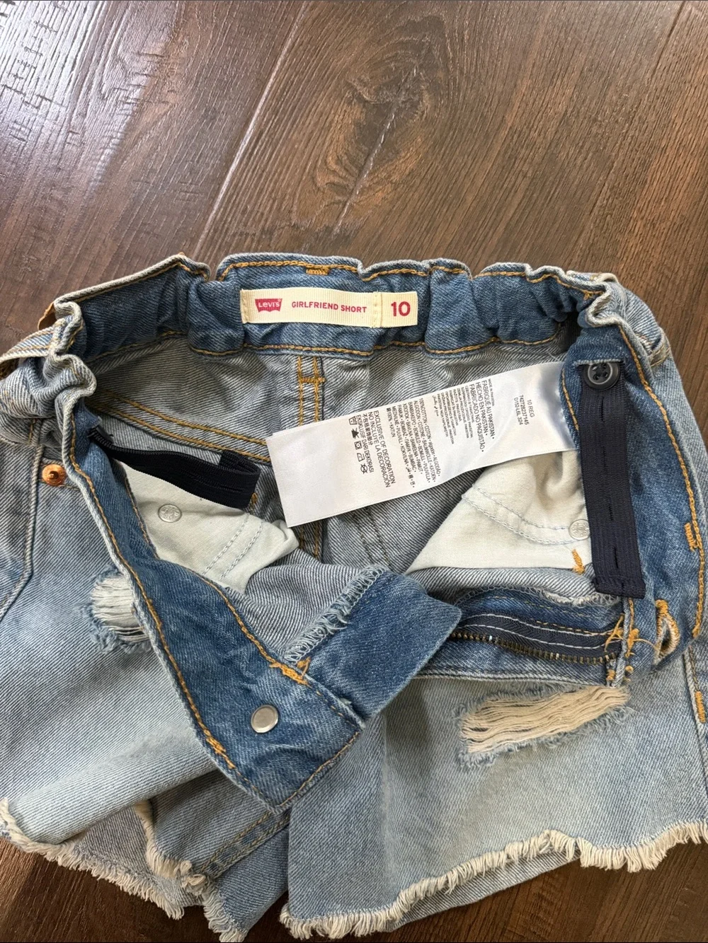 Levi's Light Blue Distressed Jean Shorts with Frayed Hem